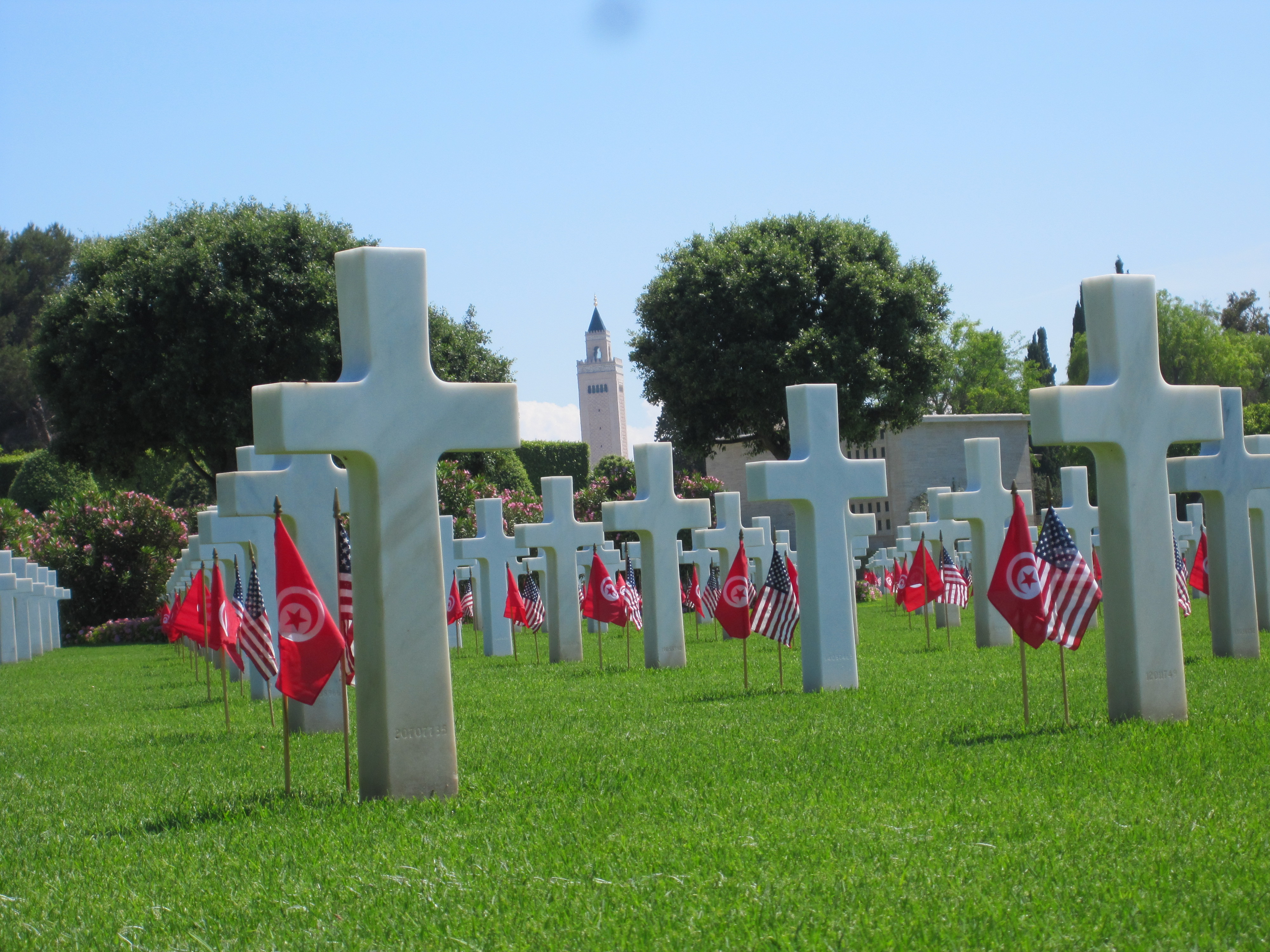 Flags at headstones at North Africa American Cemetery for Memorial Day 2012. 