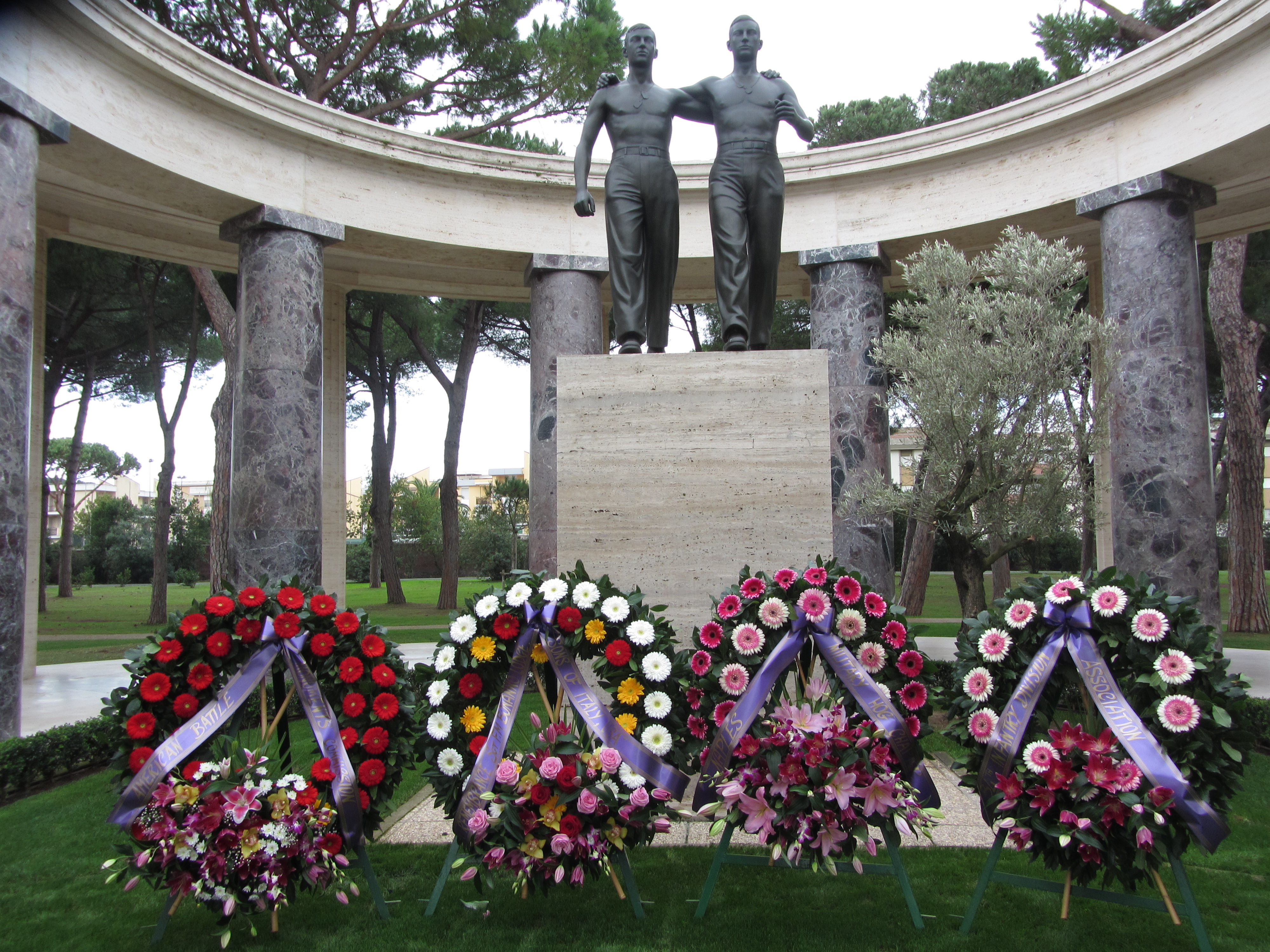 Floral wreaths were laid in front of the Brothers in Arms statue. 