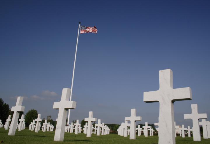 Headstones and American flag, Somme American Cemetery.