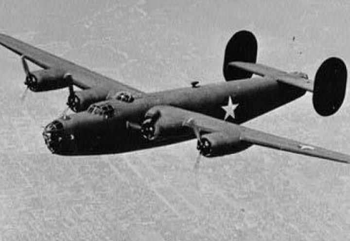 This historic images shows the B-24 flying. 