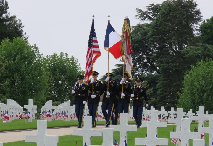 Members of the Honor Guard march through the cemetery.