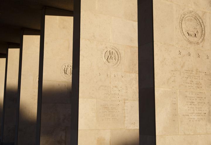 Stone colonnades at Henri-Chapelle American Cemetery include names of the missing. 