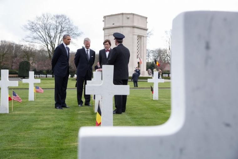 President Obama stands amongst the headstones at Flanders Field American Cemetery