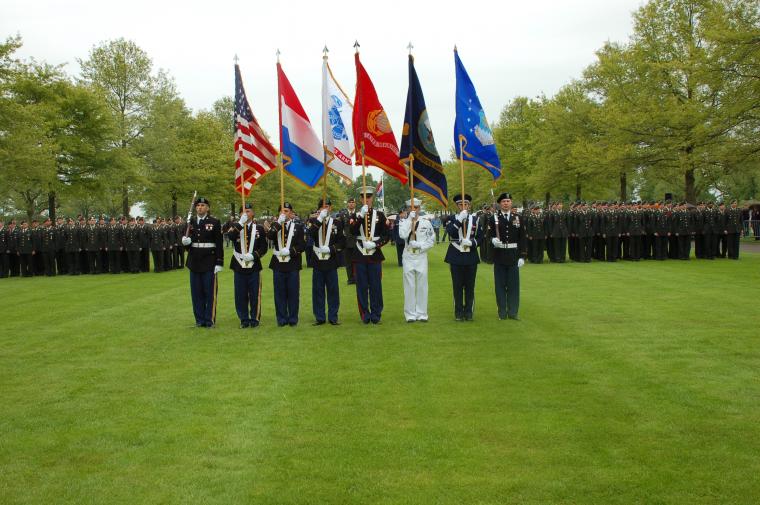 A U.S. Color Guard stands in a straight line during the ceremony. 