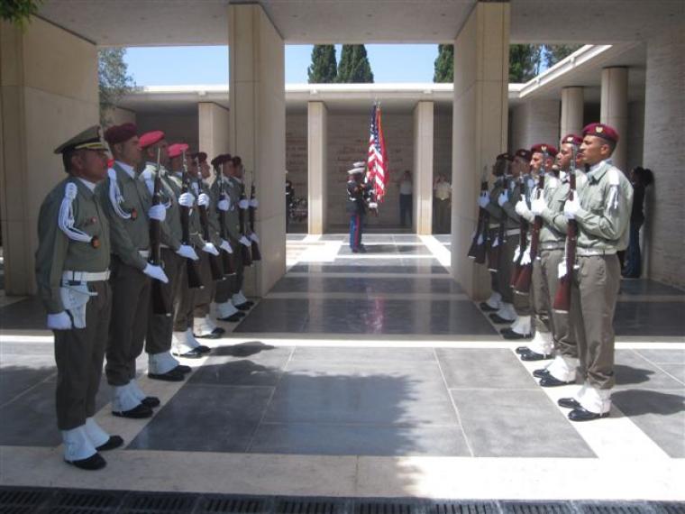 Members of the Tunisian military stand at attention during the ceremony. 