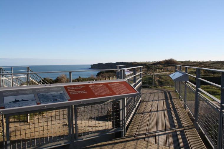 Panels on top of a platform help tell the Pointe du Hoc story. 