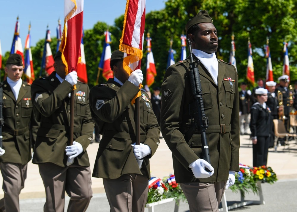 U.S. Army Soldiers assigned to United States Army Europe retire the colors during the Meuse-Argonne American Cemetery ceremony in Romagne-sous-Montfaucon, France, May 28, 2023. U.S. Army photo by Army Sergeant Willie Reese IV