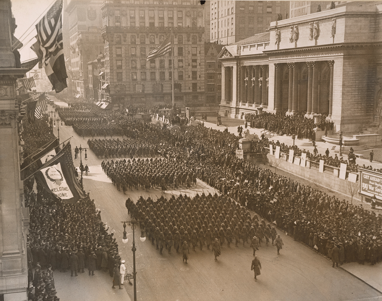 The all-Black 369th Division, or Harlem Hellfighters, return home to New York City for a victory parade after fighting valiantly in World War I, Feb. 18, 1919. Photo via National Archives, originally captured by Western Newspapers Union