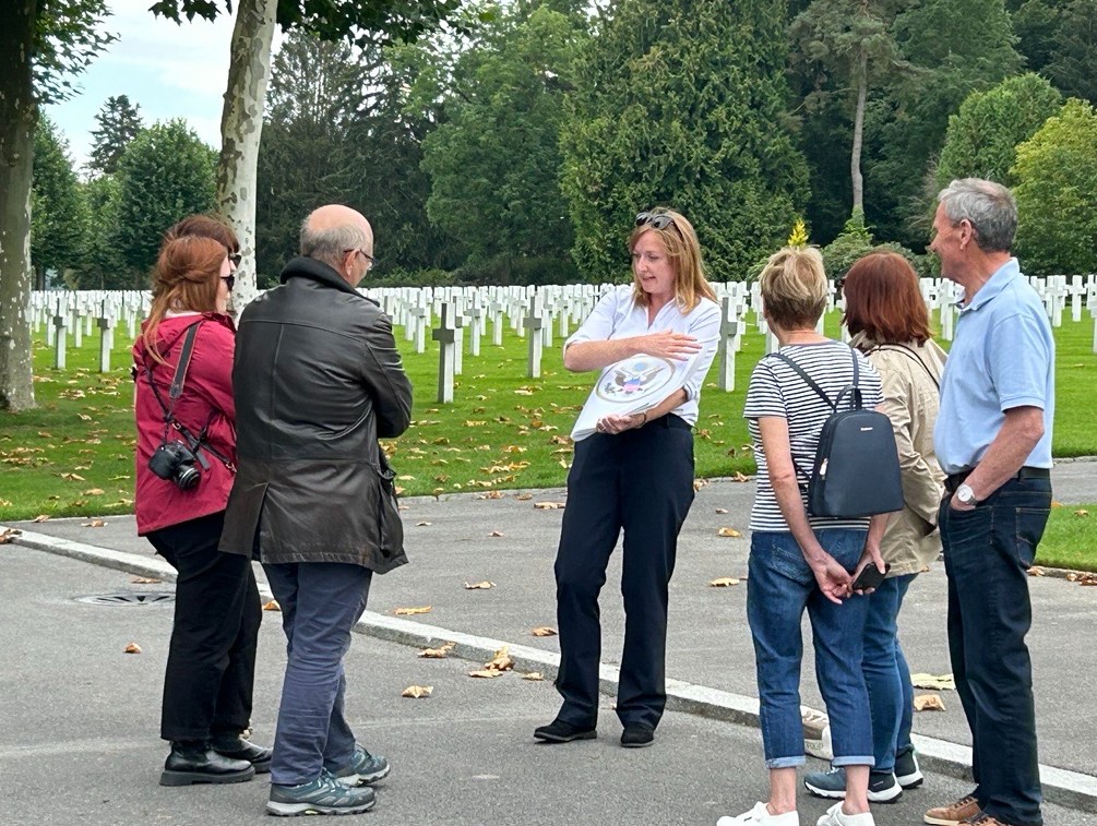 Visitors following a tour at Aisne-Marne American Cemetery. Credits: American Battle Monuments Commission