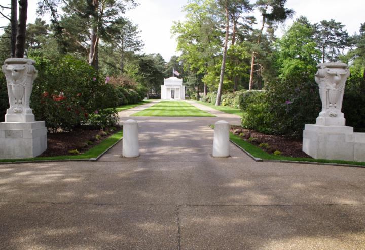 Picture of the chapel with flags at Brookwood American Cemetery. Credits: American Battle Monuments Commission/ Robert Uth.