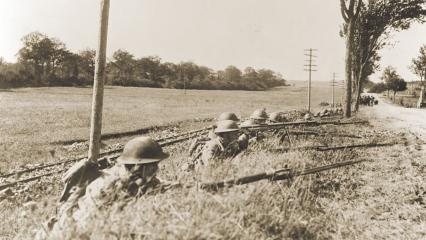Soldiers of Company B, 165th Infantry Regiment, 42nd Division, at the ready, September 1918.