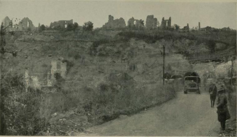 Historic image showing destroyed town of Cheppy in the background. 