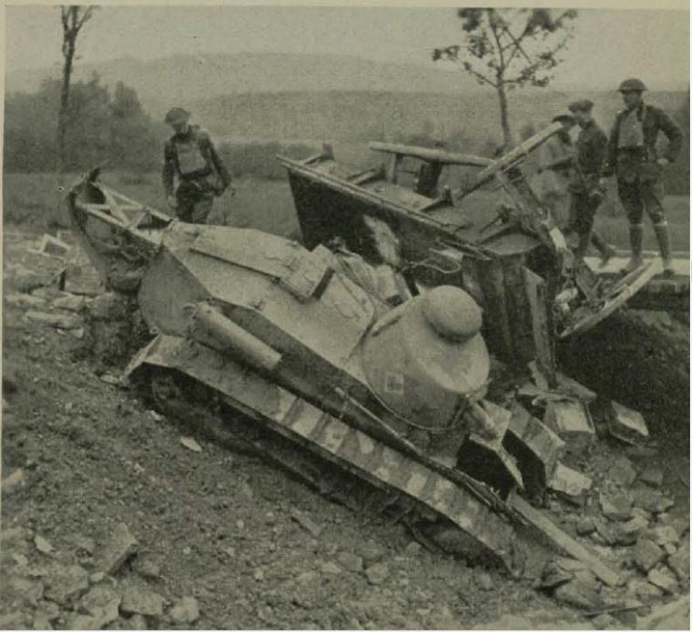 Historic image showing blown-up tank and supply wagon. 