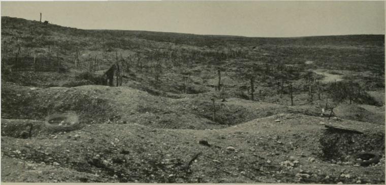 Historic image showing pocked terrain from artillery shells.