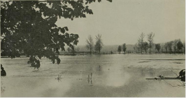Historic image showing a swollen Meuse River.