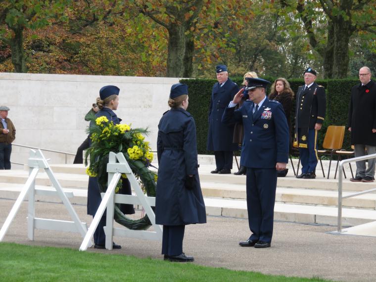 Maj. Gen. Martinez salutes after laying a wreath. 