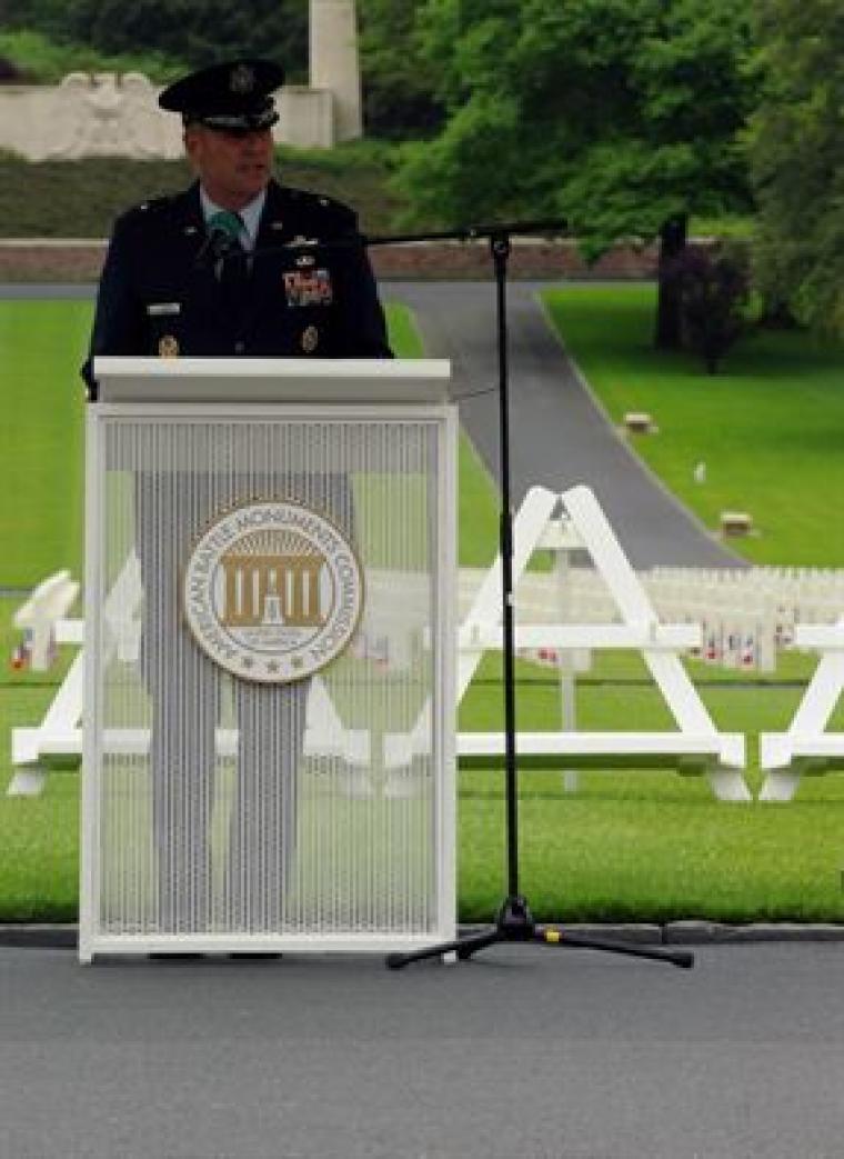 Brig. Gen. Thomas delivers remarks from the podium. 