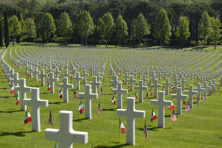 An American and Italian flag are placed in front of every headstone.