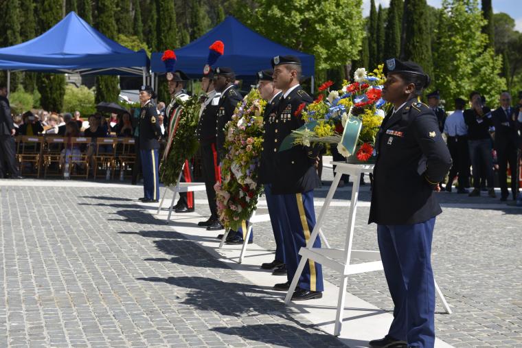 Members of the military prepare to lay wreaths during the ceremony. 