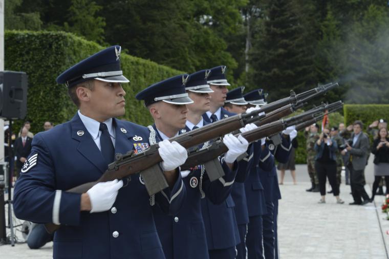 Members of the Air Force fire their weapons as part of a ceremonial volley.