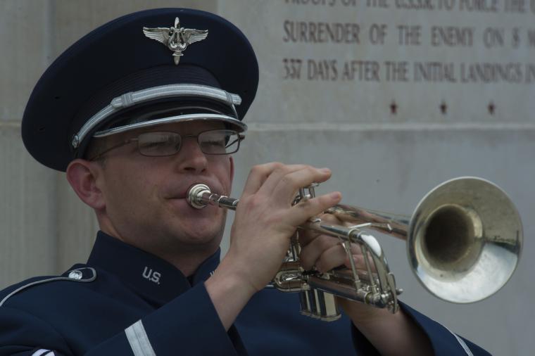 A member of the Air Force plays the trumpet. 