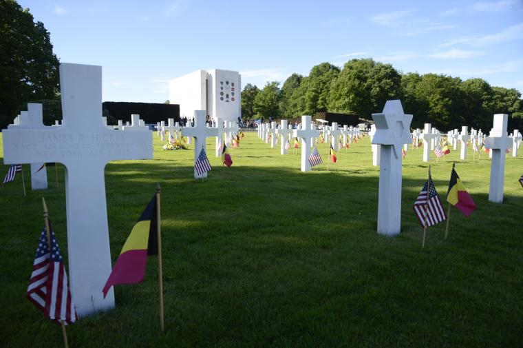 Flags are seen in front of every headstone.