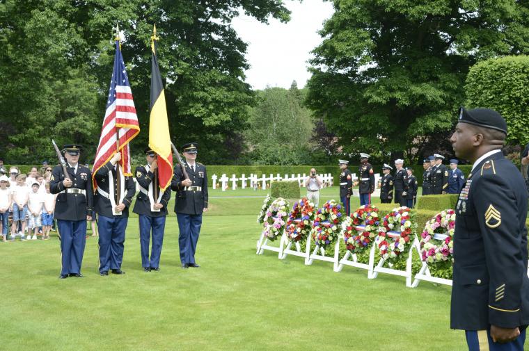 Men in uniform serve as the Honor Guard. 