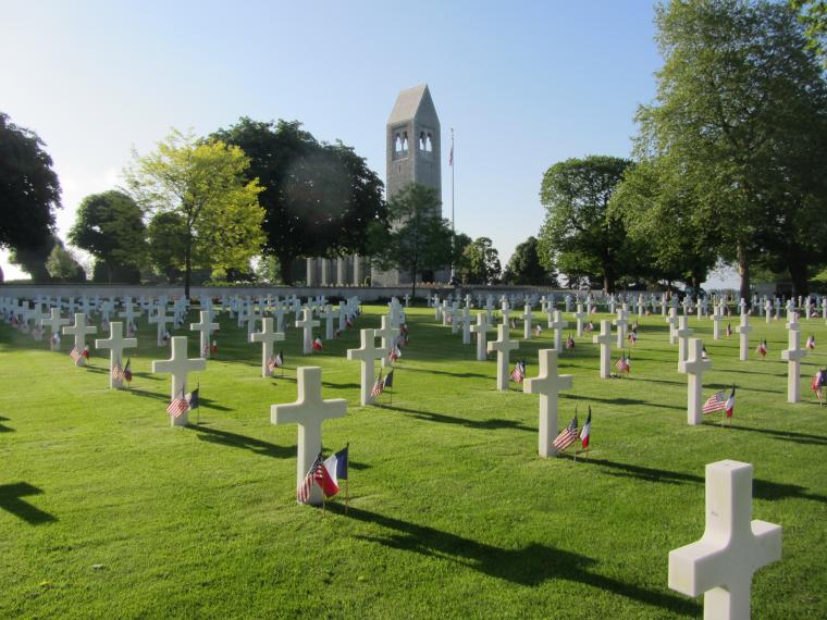 An American and French flag are in place at every headstone. 