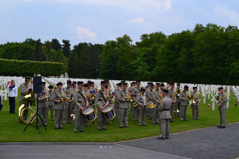 Members of a military band participate in the ceremony.