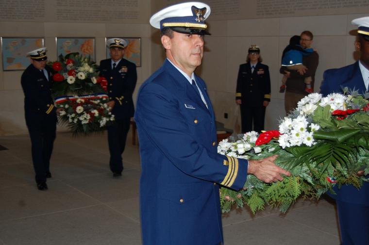 Members of the U.S. Coast Guard lay floral wreaths in the chapel. 