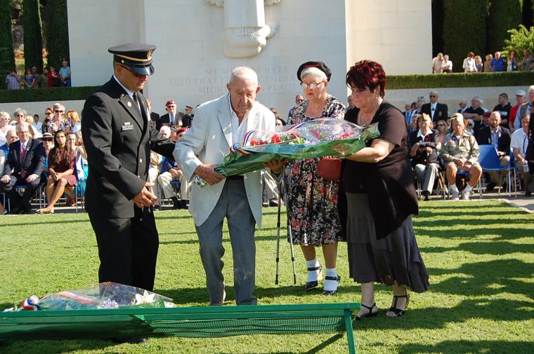 French Resistance veterans lay a wreath during the ceremony. 