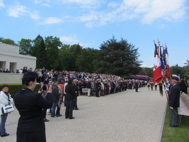 Attendees stand in anticipation of the wreath laying. 