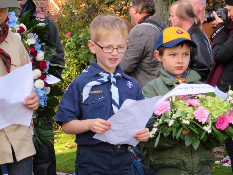 Boy scouts read poems during the ceremony. 