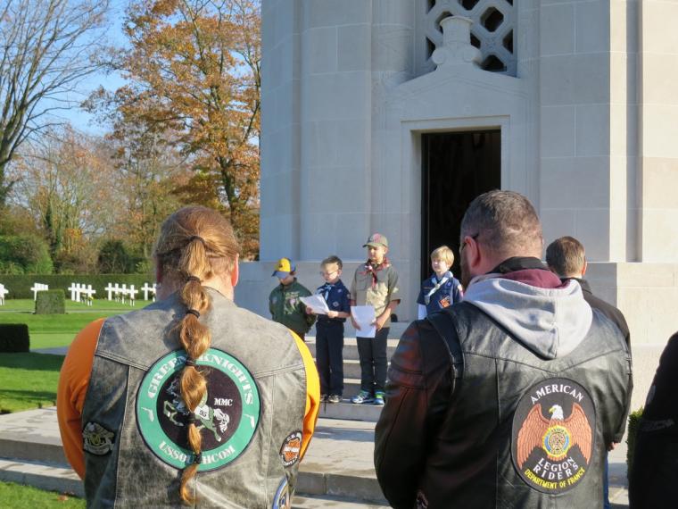 American Legion Riders look on as the boy scouts read poems during the ceremony.