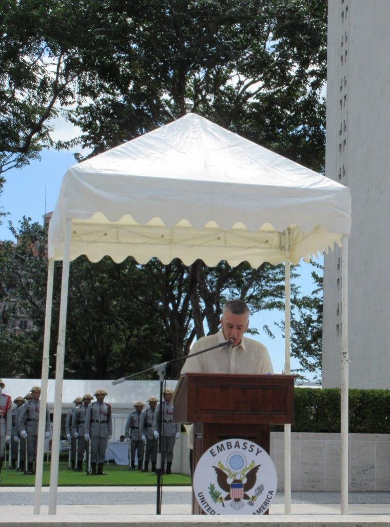 Ambassador Goldberg delivers remarks from the podium during the ceremony.