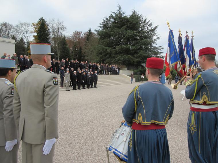Members of the French military stand in uniform during the ceremony. 