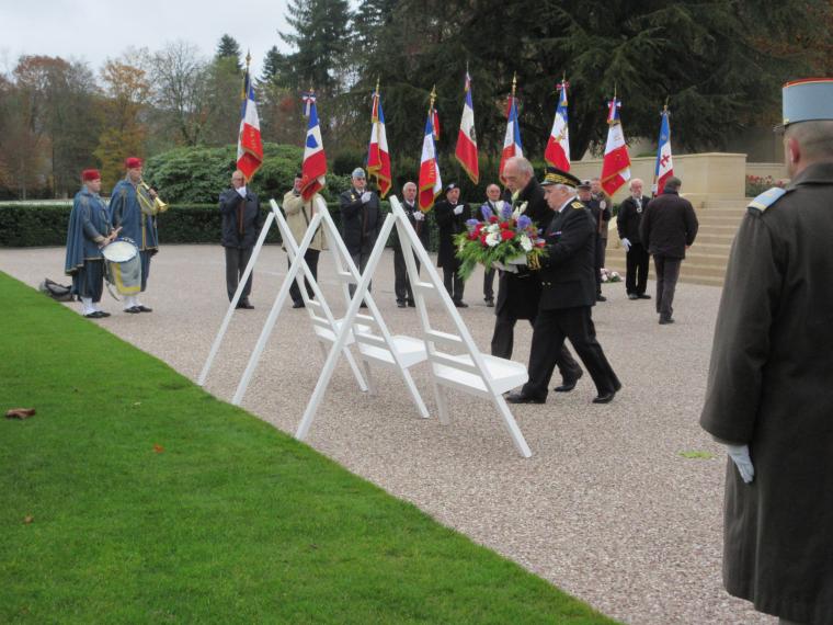 Members of the official party lay a wreath during the ceremony. 