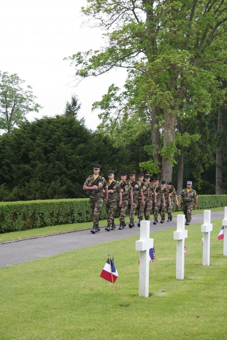 A French Honor Platoon marches out during the ceremony. 