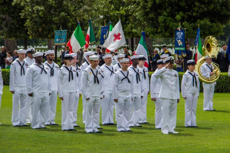 Sailors stand in straight lines during the ceremony. 