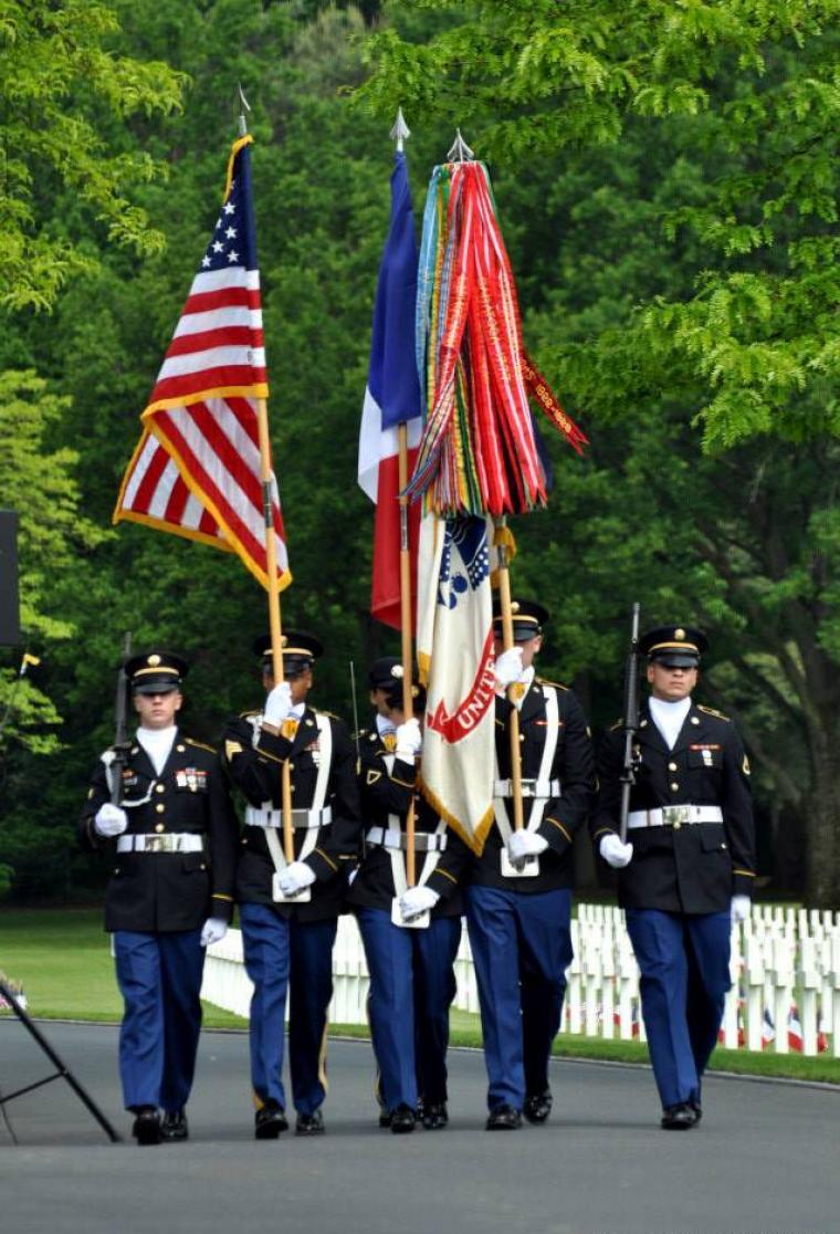 A U.S. Color Guard marches in during the ceremony.