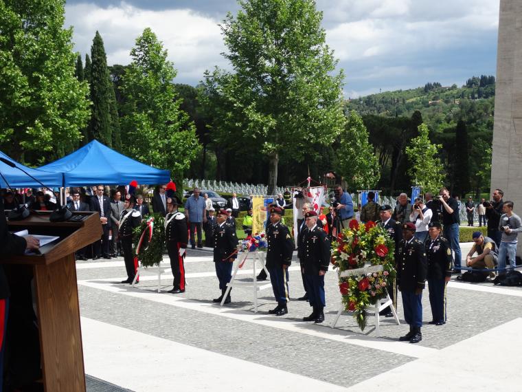 Members of the American and Italian military lay wreaths during the ceremony.
