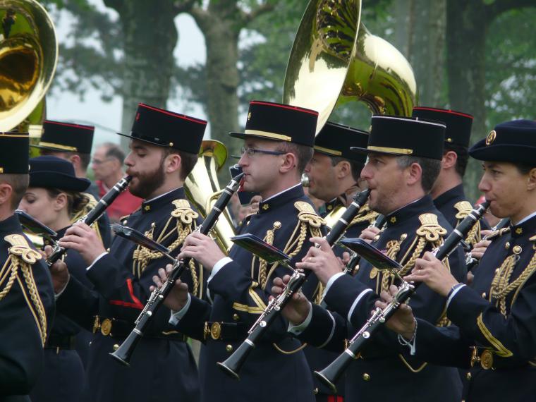 Members of a French military band play the clarinet. 