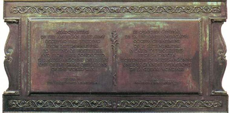 A bronze tablet with inscribed text serves as the Souilly Marker.