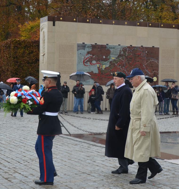 Representatives from the group prepare to lay a wreath.